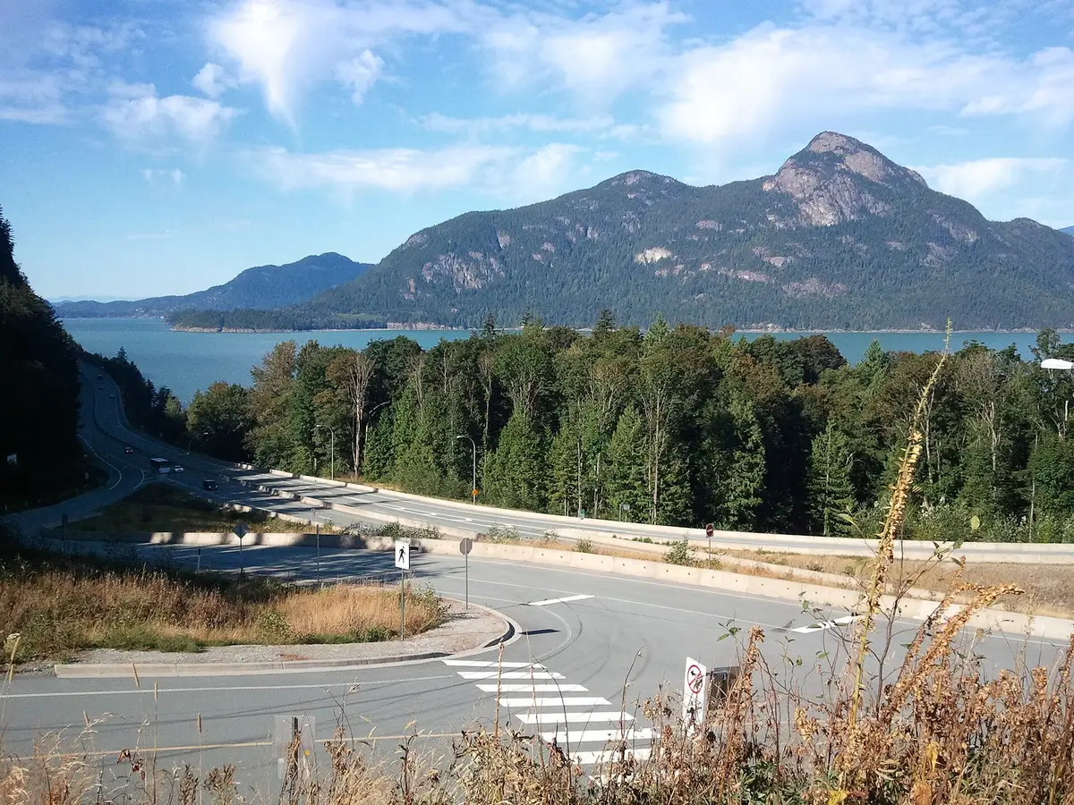 The Sea-to-Sky Highway running along the shore of Howe Sound in British Columbia