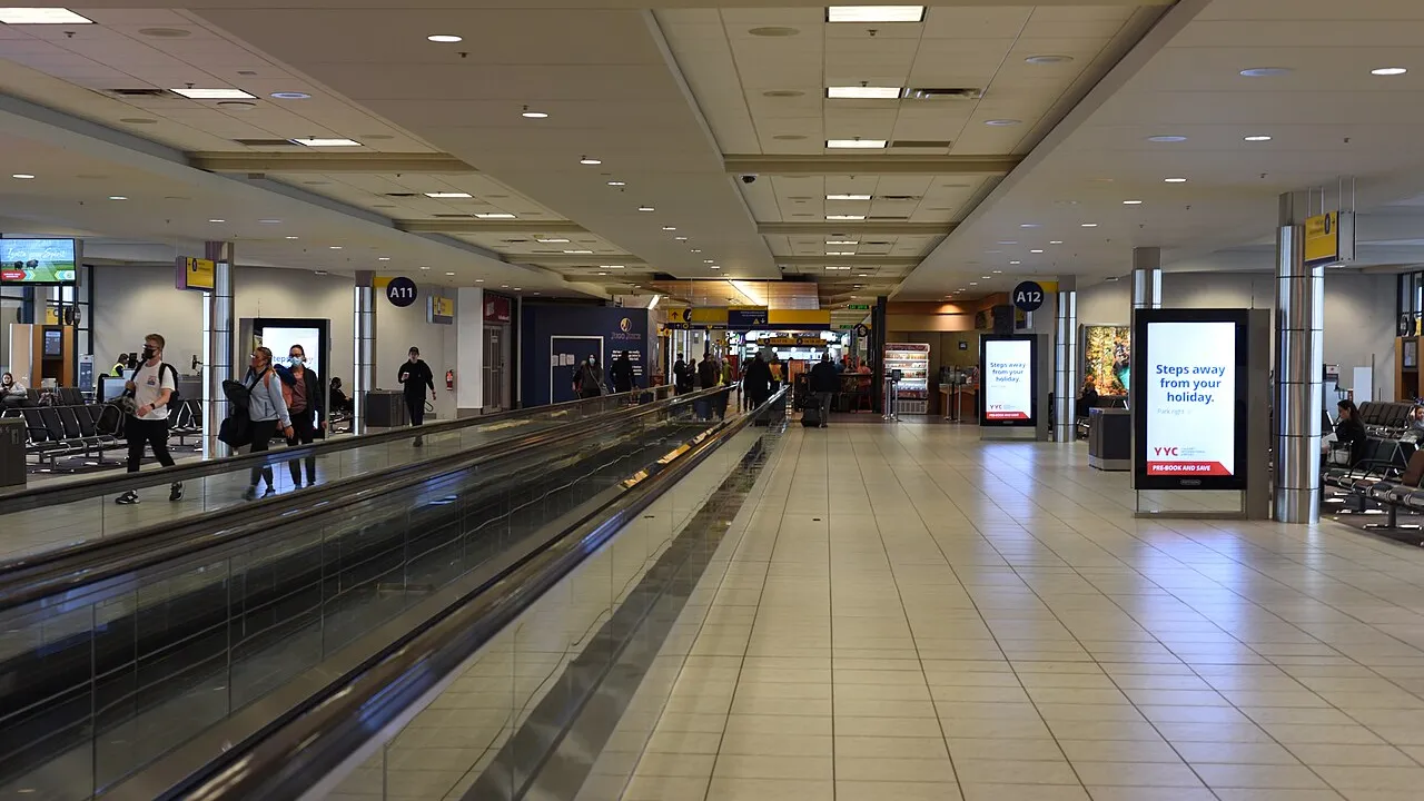 The terminal building at Calgary International Airport under a wide prairie sky
