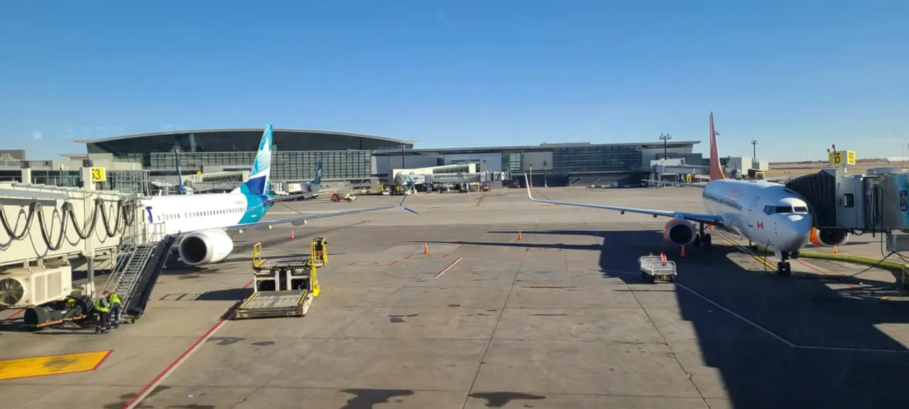Parked airplanes at gates at Calgary International Airport