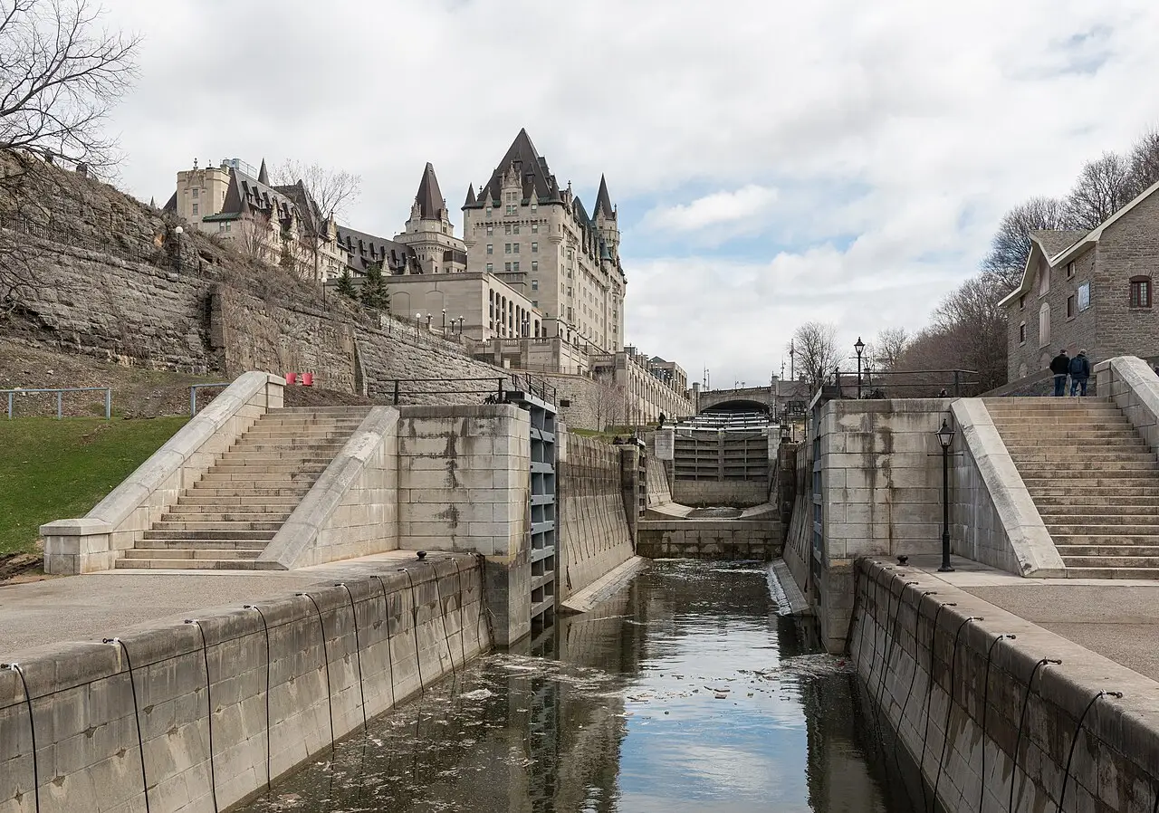 The Rideau Canal locks stepping down to the Ottawa River beside the turreted Chateau Laurier hotel