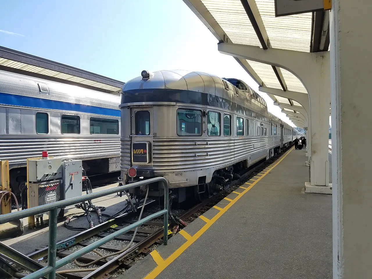 The rounded observation end of a VIA Rail Park car at Pacific Central Station in Vancouver