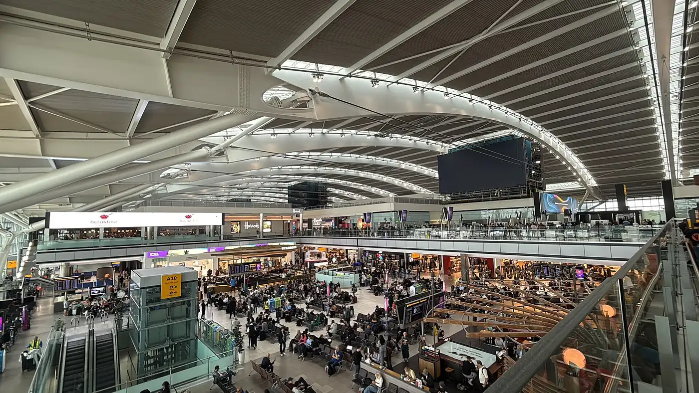 The exterior of Heathrow Airport Terminal 5 under a clear sky