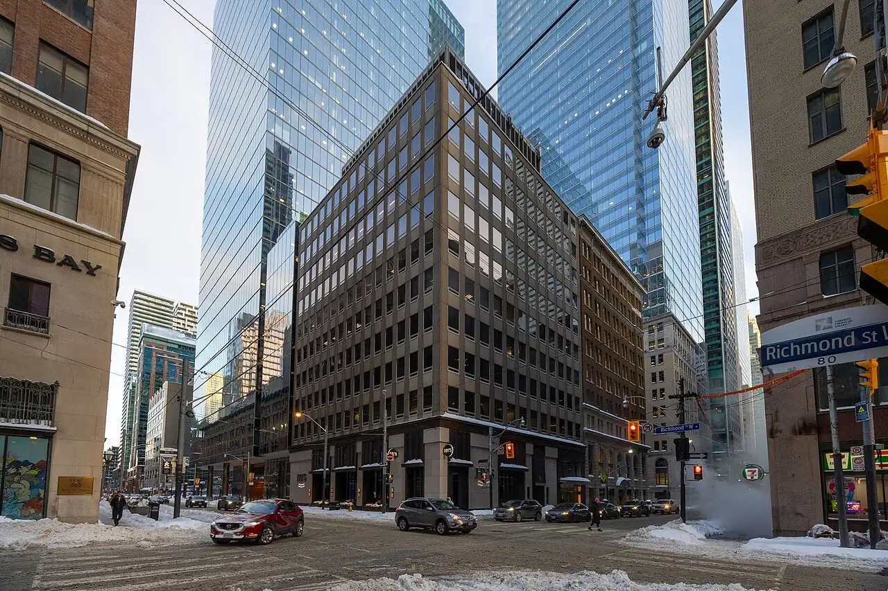 Snowbanks and slush at the corner of Bay and Richmond Streets in downtown Toronto after a January snowfall