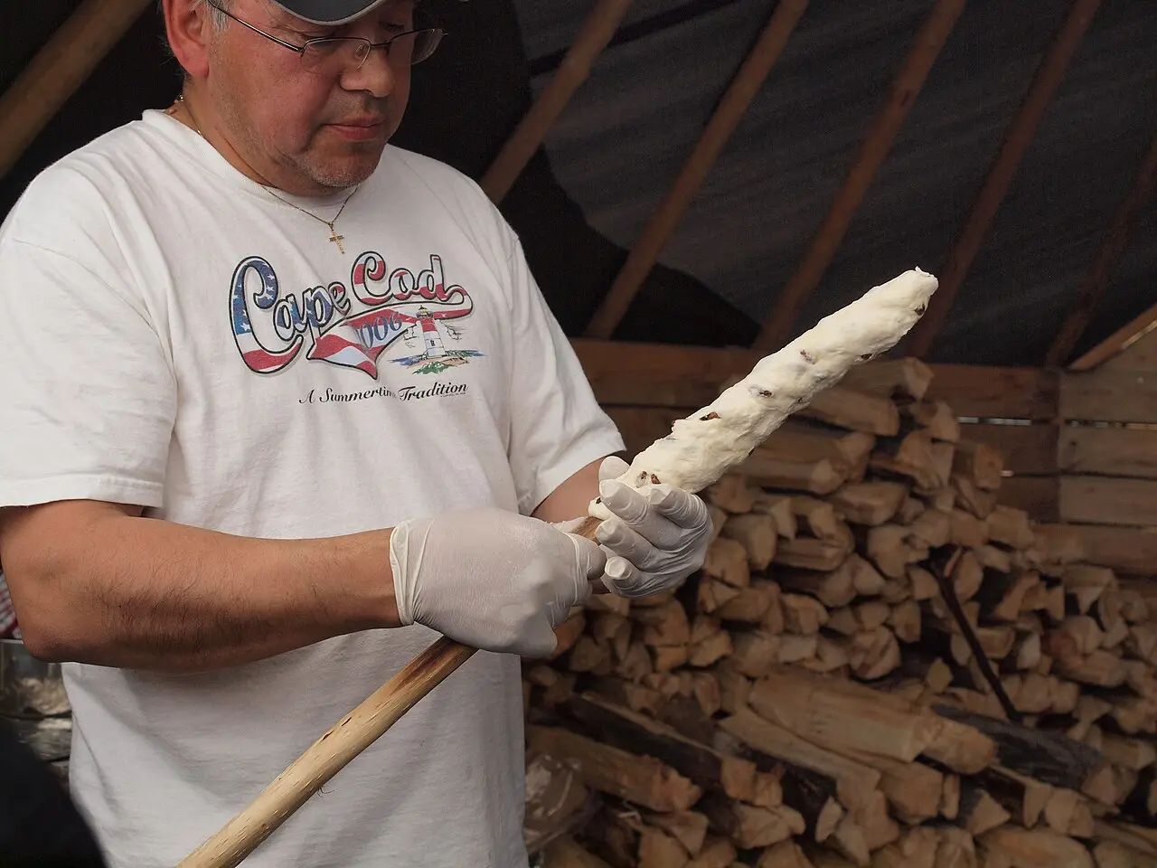 Dough wrapped around a stick and baked over the coals of an open fire