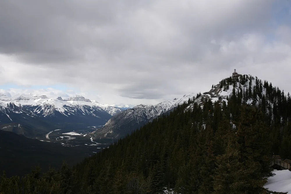 A wooden boardwalk running along the summit ridge of Sulphur Mountain high above the Bow Valley