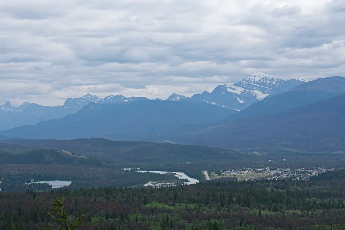 The town of Jasper spread across its wide forested valley, seen from the trail above Pyramid Lake