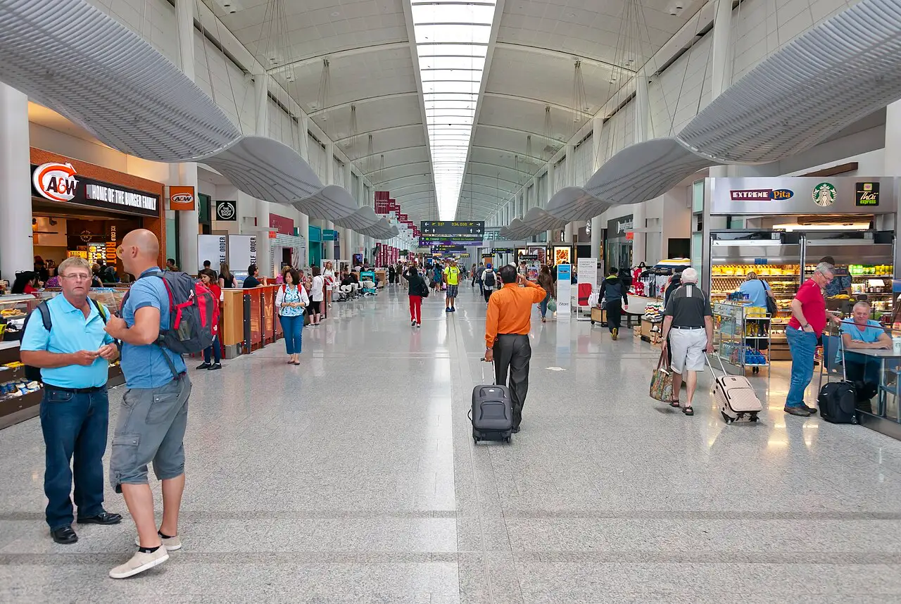 Wide interior view of Terminal 1 departures hall at Toronto Pearson