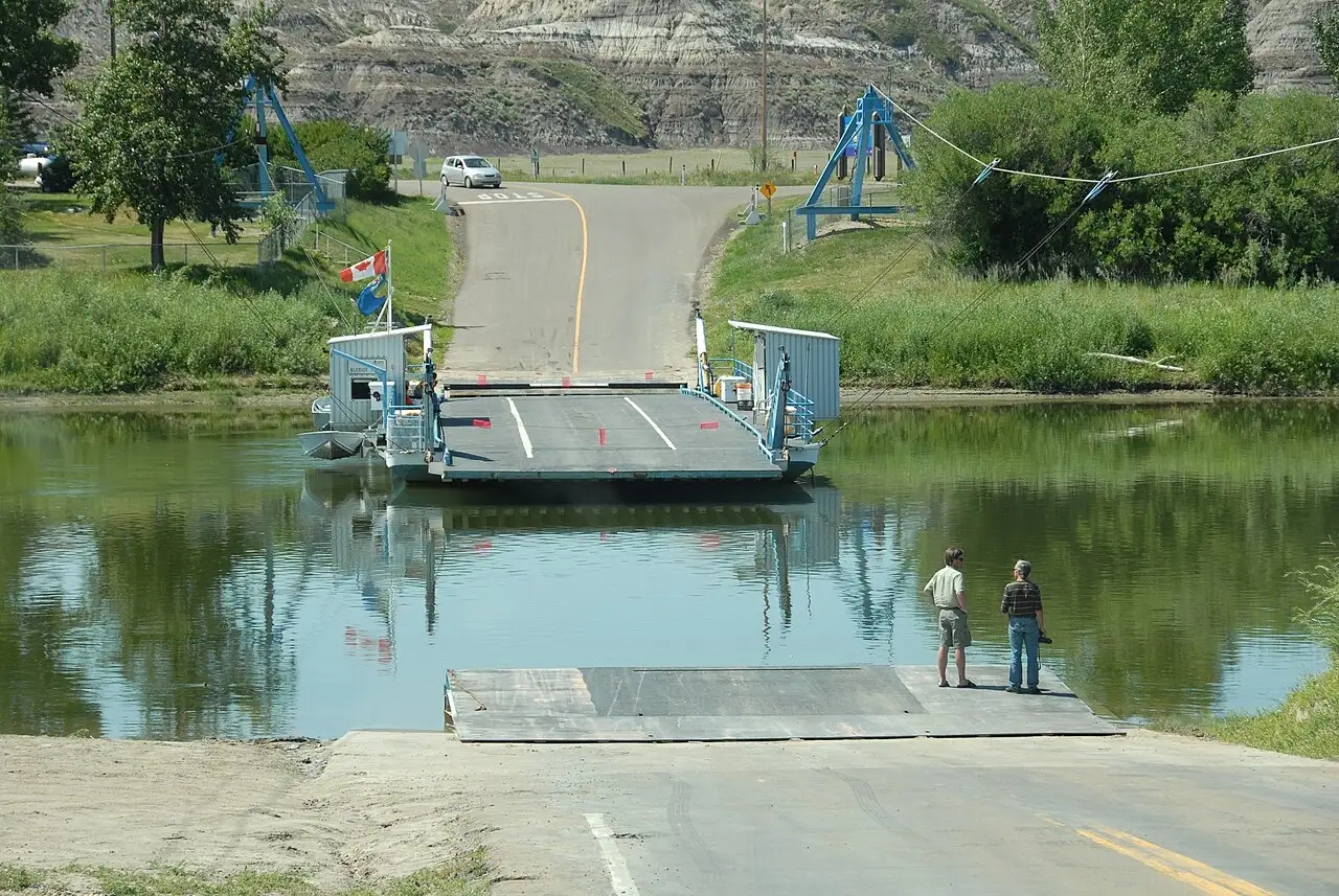 The small Bleriot cable ferry crossing the Red Deer River northwest of Drumheller, Alberta