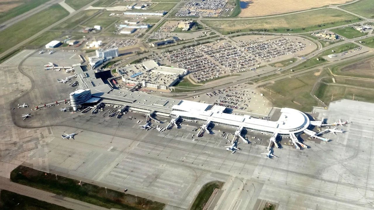 The terminal building at Edmonton International Airport under a wide prairie sky