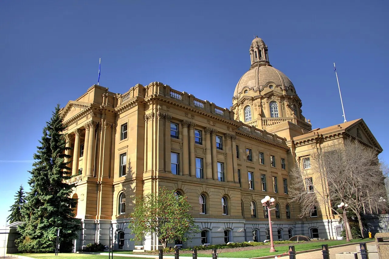 The domed sandstone Alberta Legislature Building above formal gardens in Edmonton