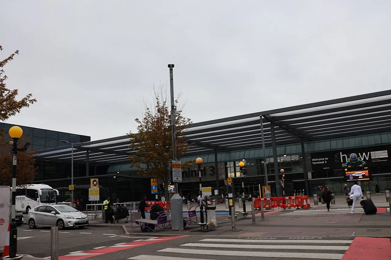 Exterior of Heathrow Airport Terminal 3 under a blue sky