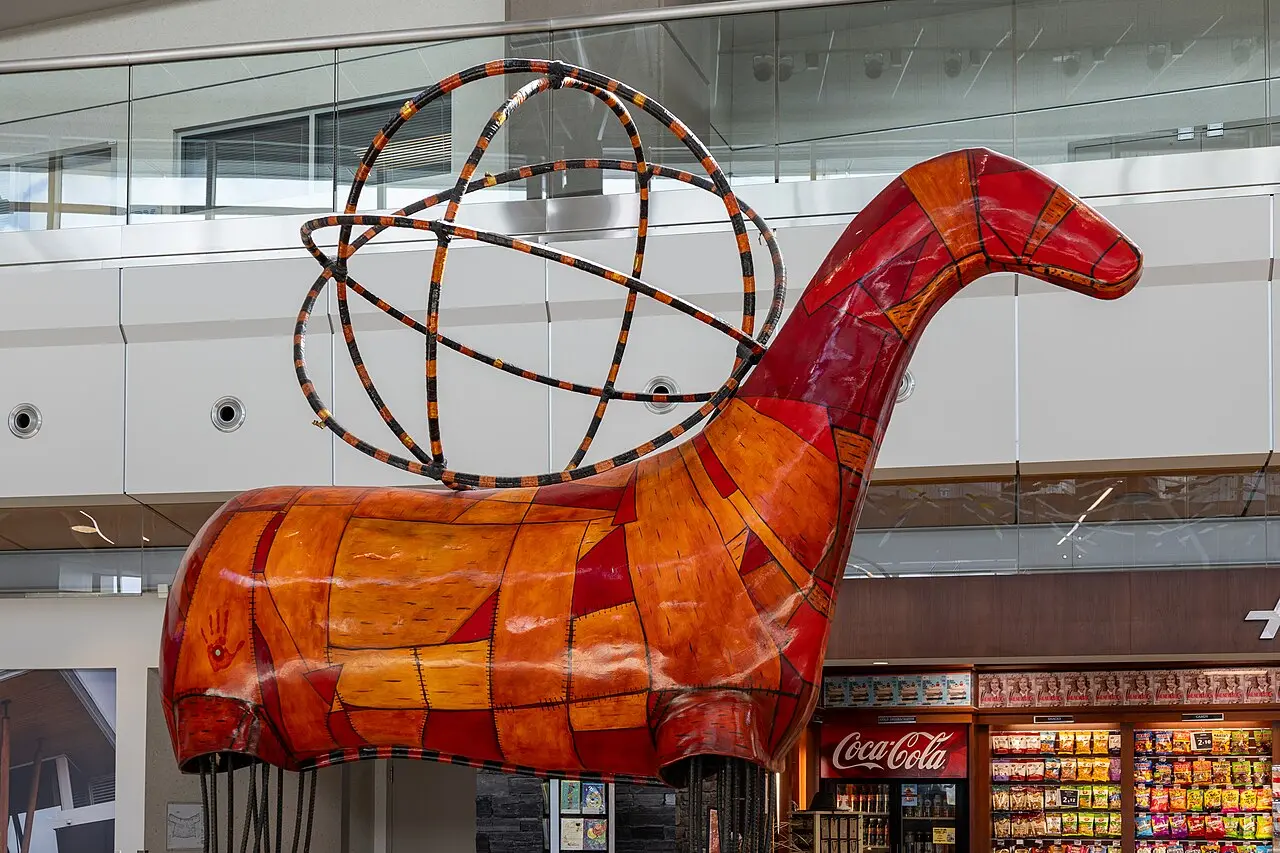 The Messenger sculpture in the arrivals hall at Calgary International Airport