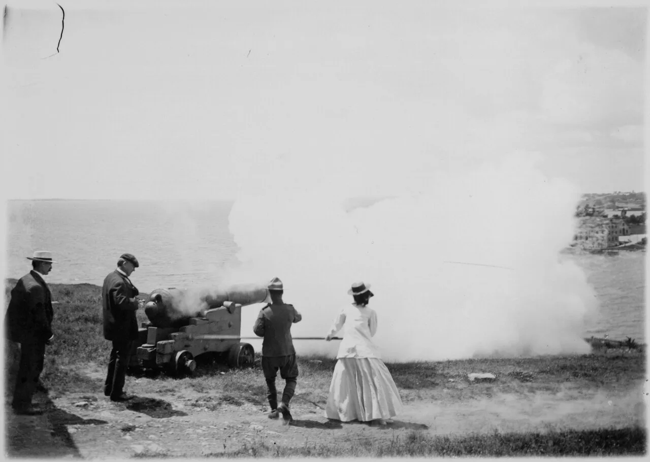 Cannon firing demonstration at Fort Henry with smoke over the walls
