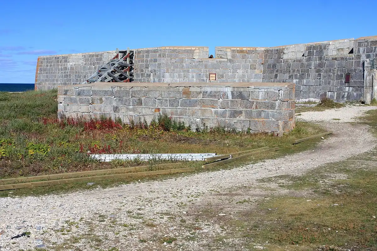 The low stone walls of the 18th-century Prince of Wales Fort at the mouth of the Churchill River