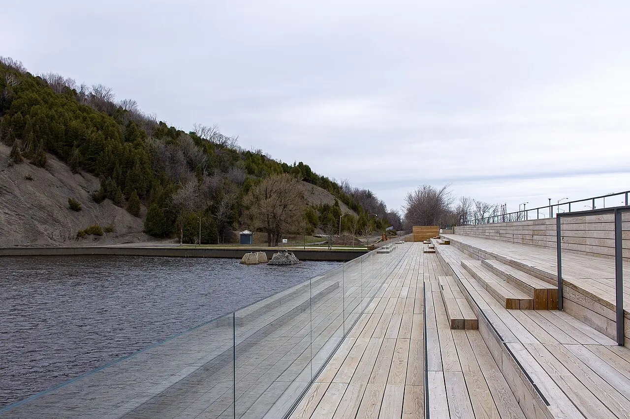 A wide wooden footbridge and boardwalk trail in the Parc de la Chute-Montmorency