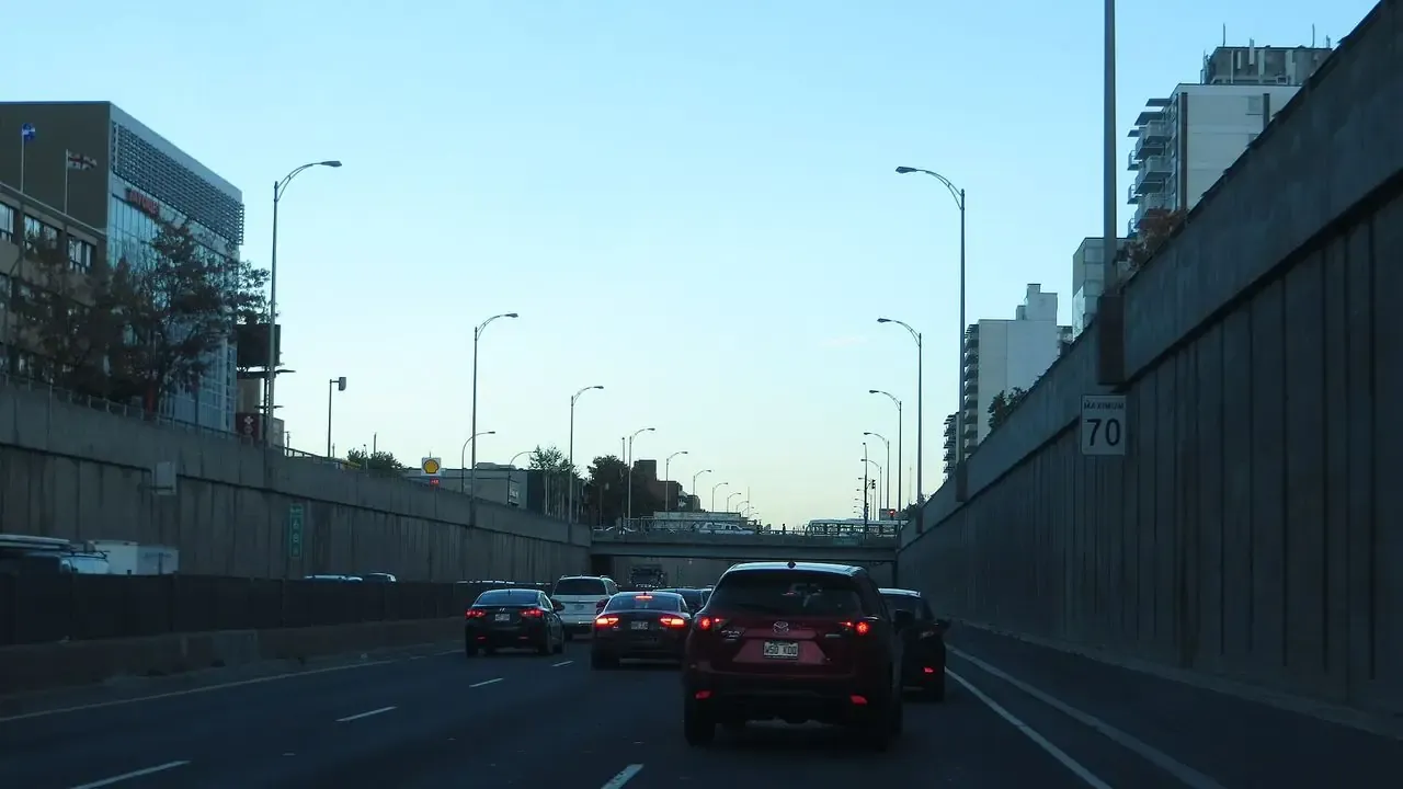 Autoroute 15 northbound through suburban Montreal toward the Laurentians