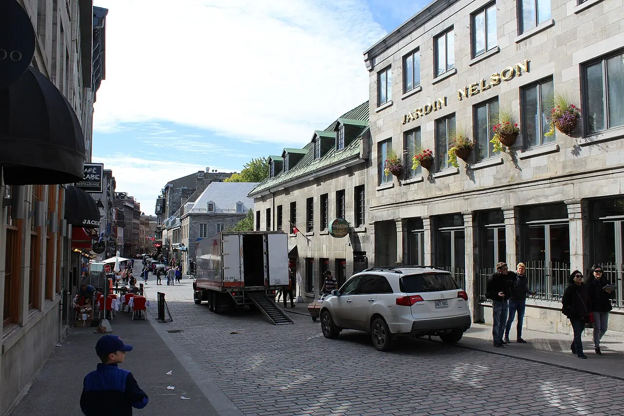 Shops and stone facades along cobbled Rue Saint-Paul in Old Montreal