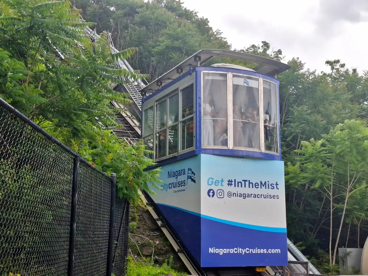 The enclosed funicular cars that carry Niagara City Cruises guests down to the river landing