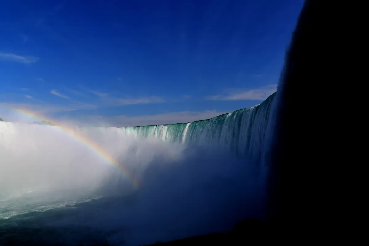 A viewing portal cut through the rock tunnels behind the falling water at Niagara