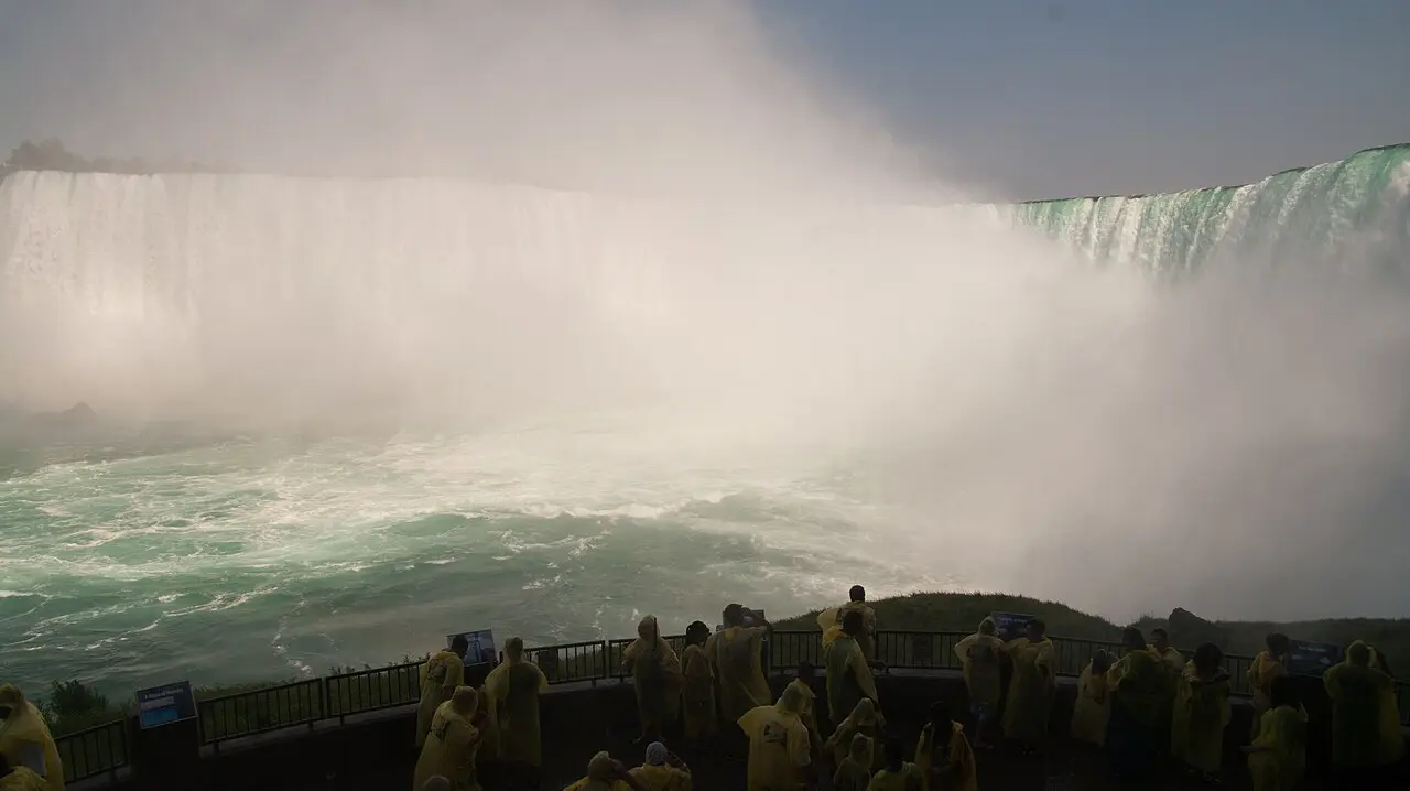 Wide view of the Horseshoe Falls mist and gorge from the Canadian Niagara Parks side