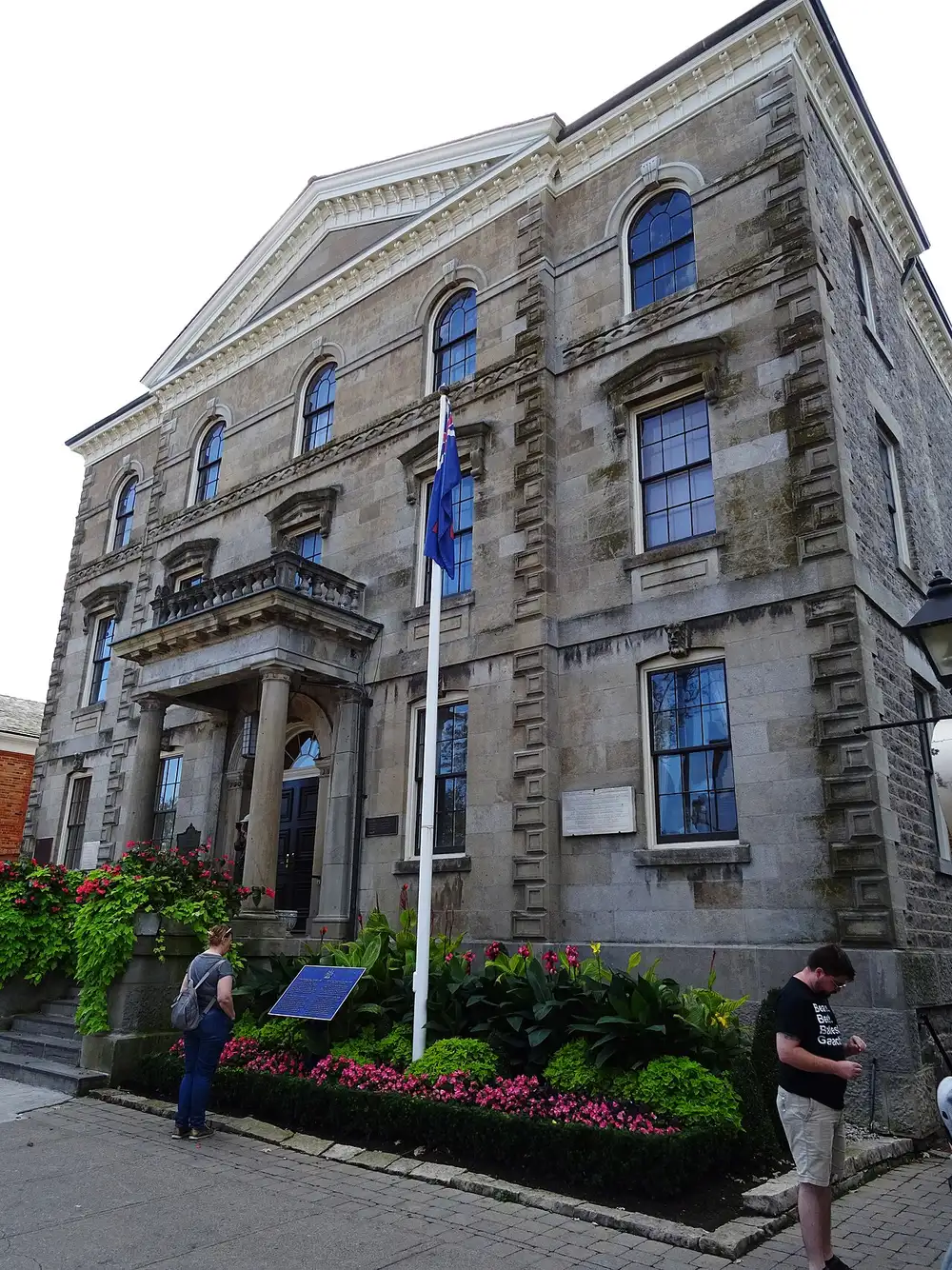 The white columned facade of the Old Court House at 26 Queen Street in Niagara-on-the-Lake