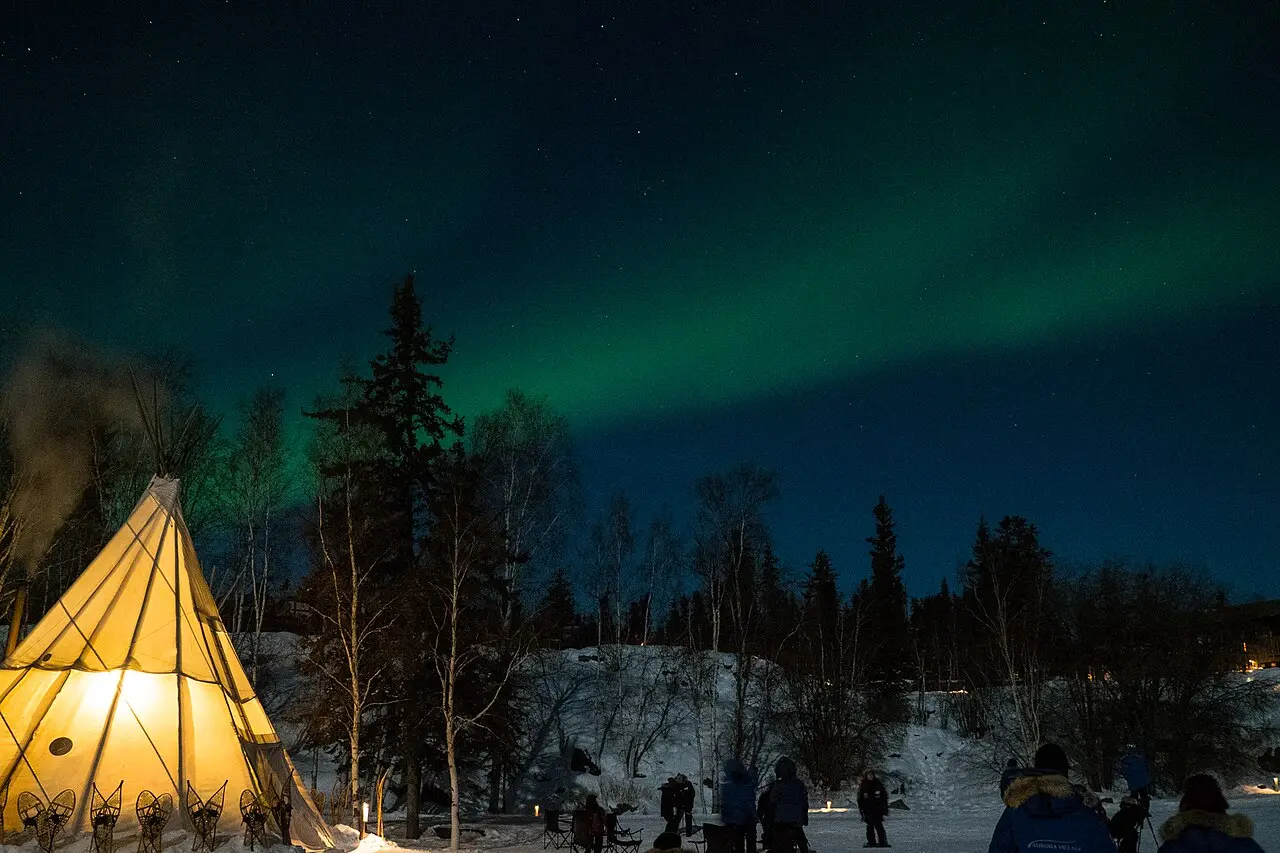 A bright green aurora curtain filling the sky over Yellowknife, Northwest Territories