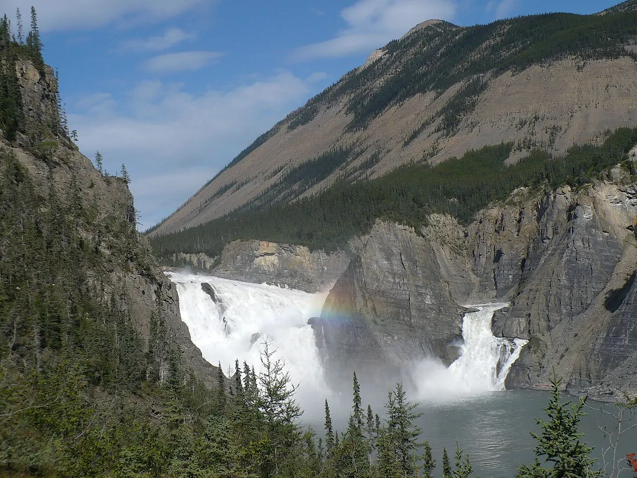 Virginia Falls thundering over a wide drop on the South Nahanni River in Nahanni National Park Reserve