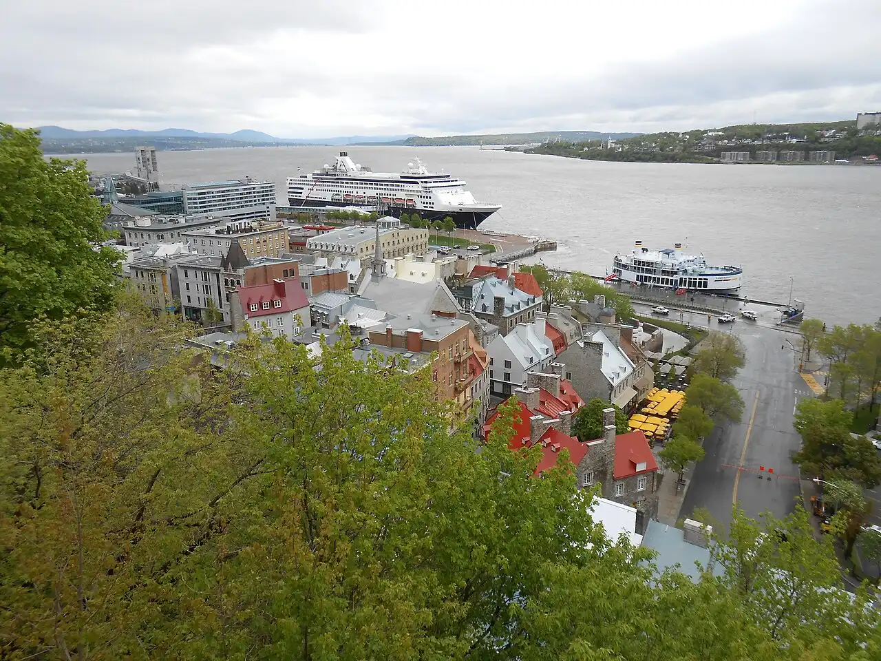 The Dufferin Terrace boardwalk in Old Quebec looking toward the Chateau Frontenac with the Saint Lawrence River below