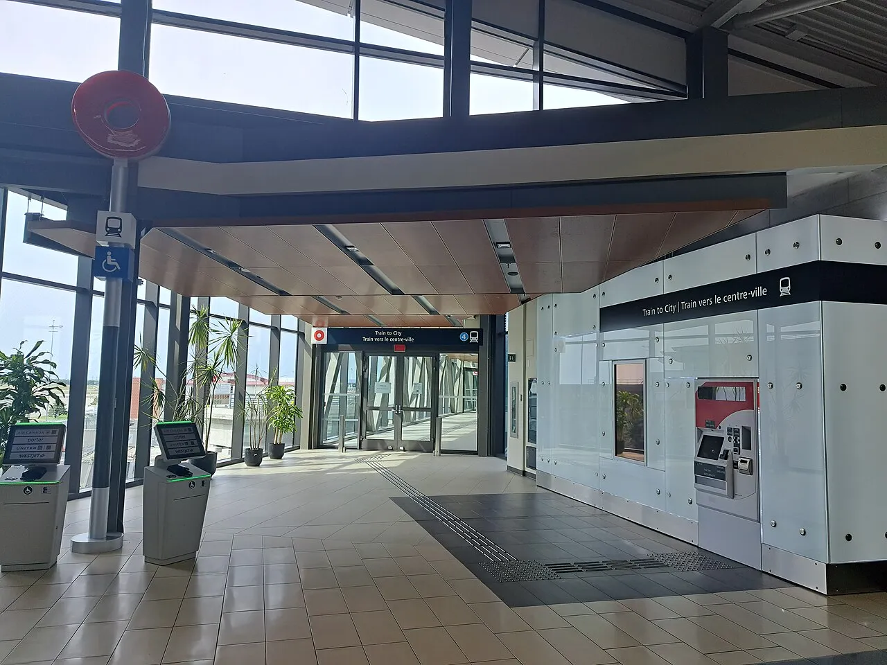 Glass-walled Airport O-Train station building at Ottawa Macdonald-Cartier International Airport