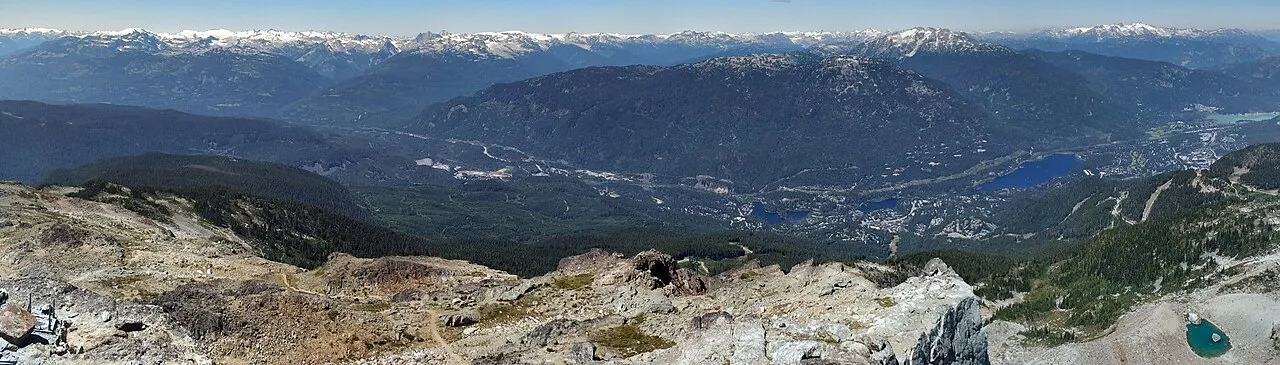 Panoramic view of Whistler Village and the valley from a lookout point high above the mountains