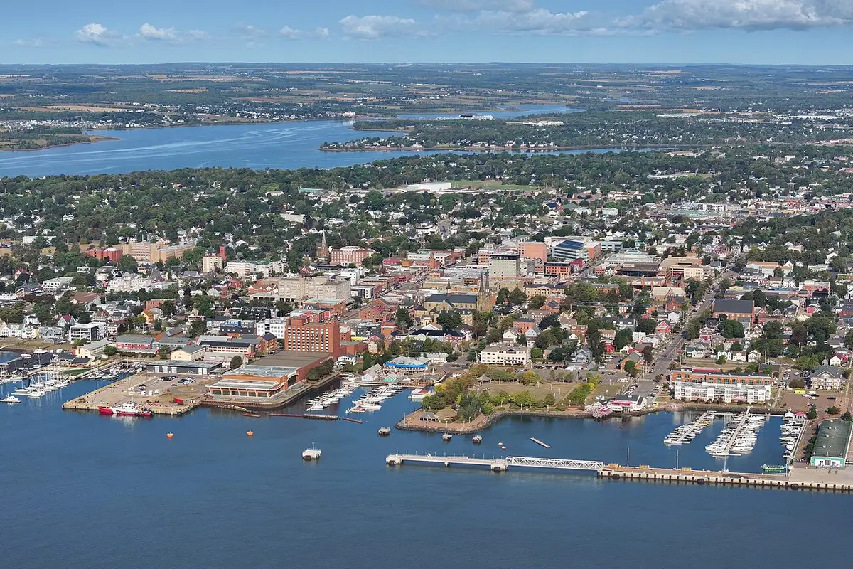 Aerial view of Charlottetown with its harbour, marina, church steeples and the river behind