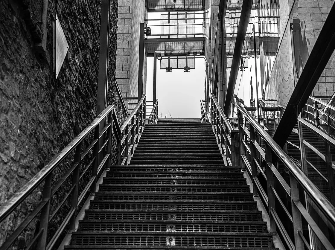 A stone staircase climbing from the Petit-Champlain quarter in Quebec City