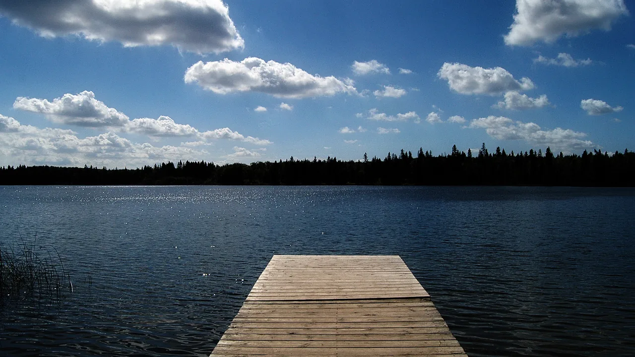 Clear Lake at Wasagaming in Riding Mountain National Park on a calm summer day