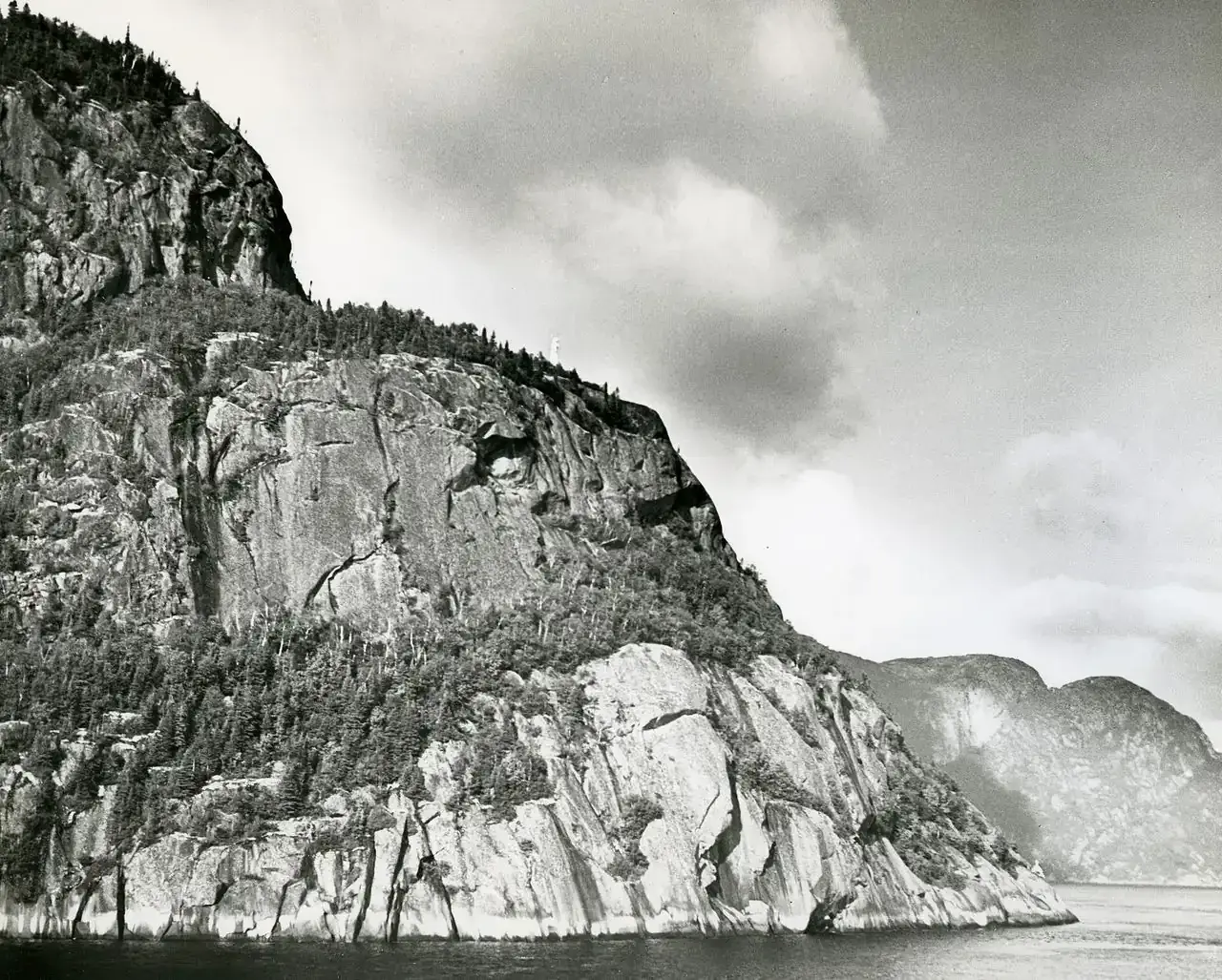 Historic photograph of Cap Trinité cliffs on the Saguenay Fjord