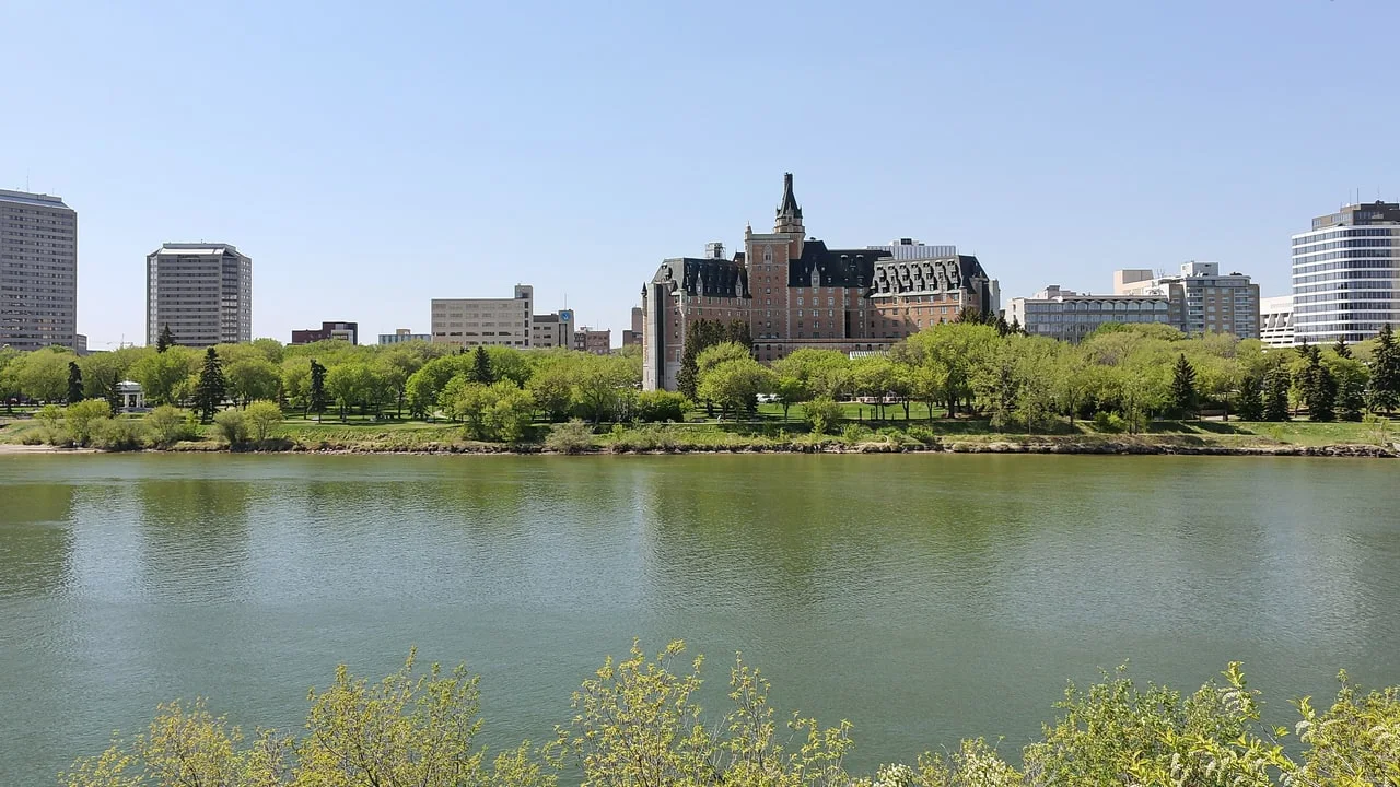 The Delta Bessborough and the Meewasin riverbank seen across the South Saskatchewan River in Saskatoon