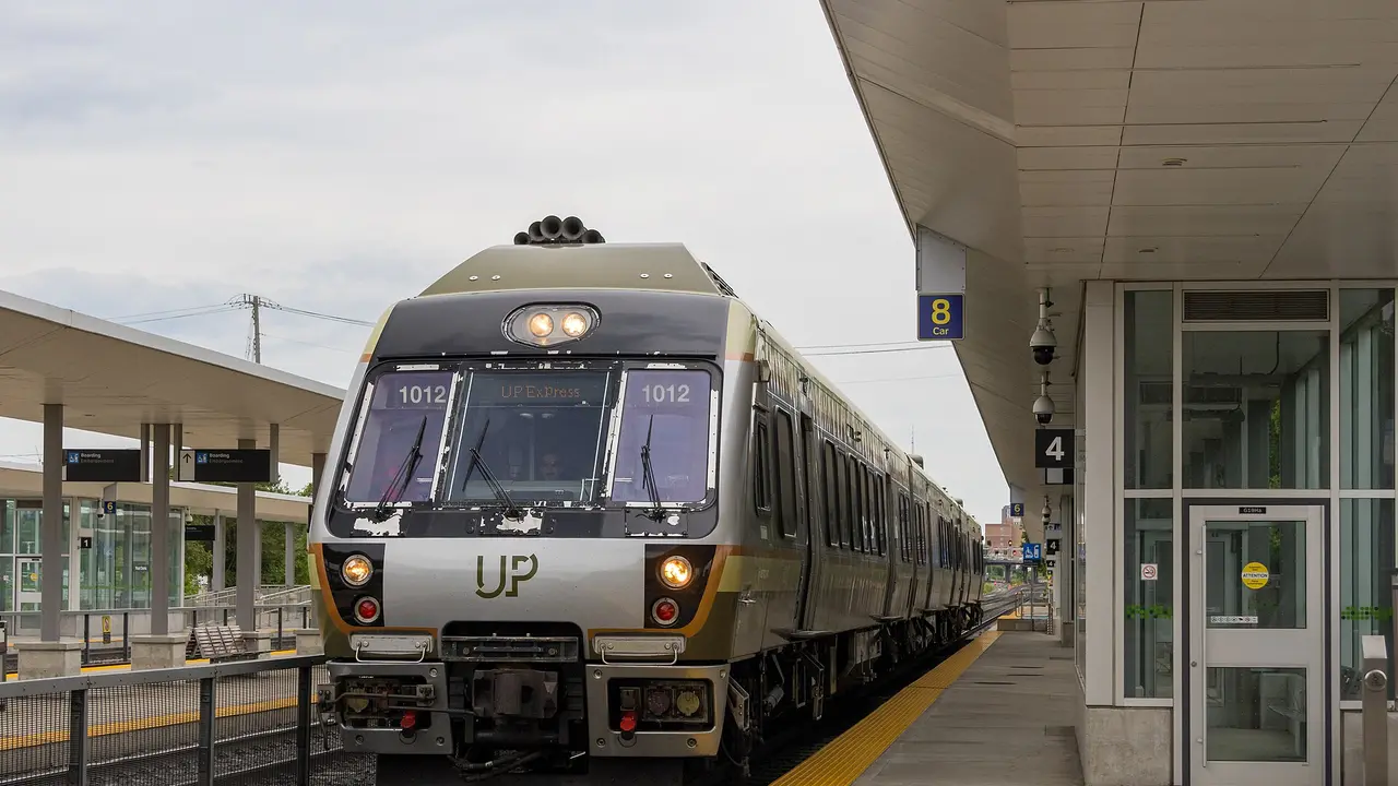 A UP Express train waiting at a platform on the line between Pearson airport and Union Station