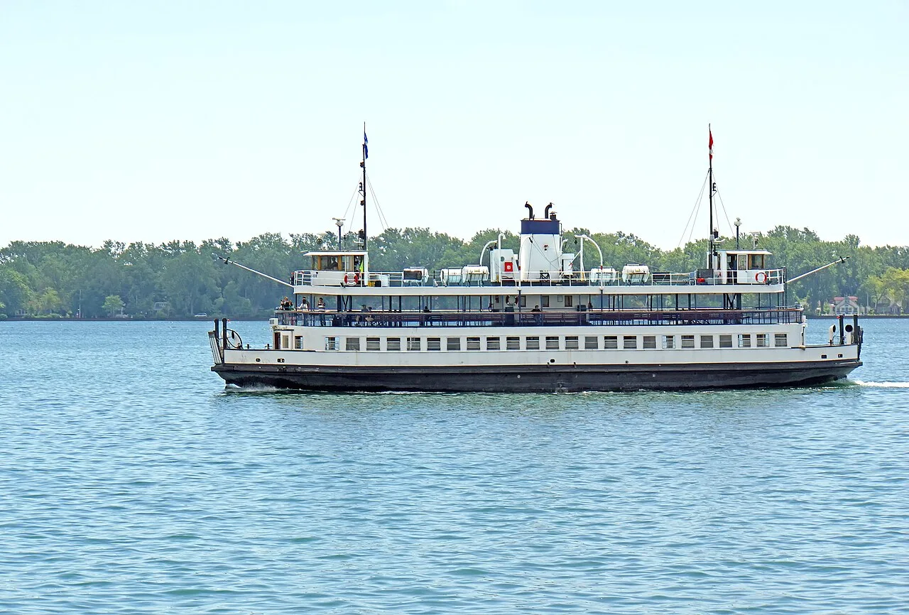 A city ferry crossing the harbour toward the Toronto Islands