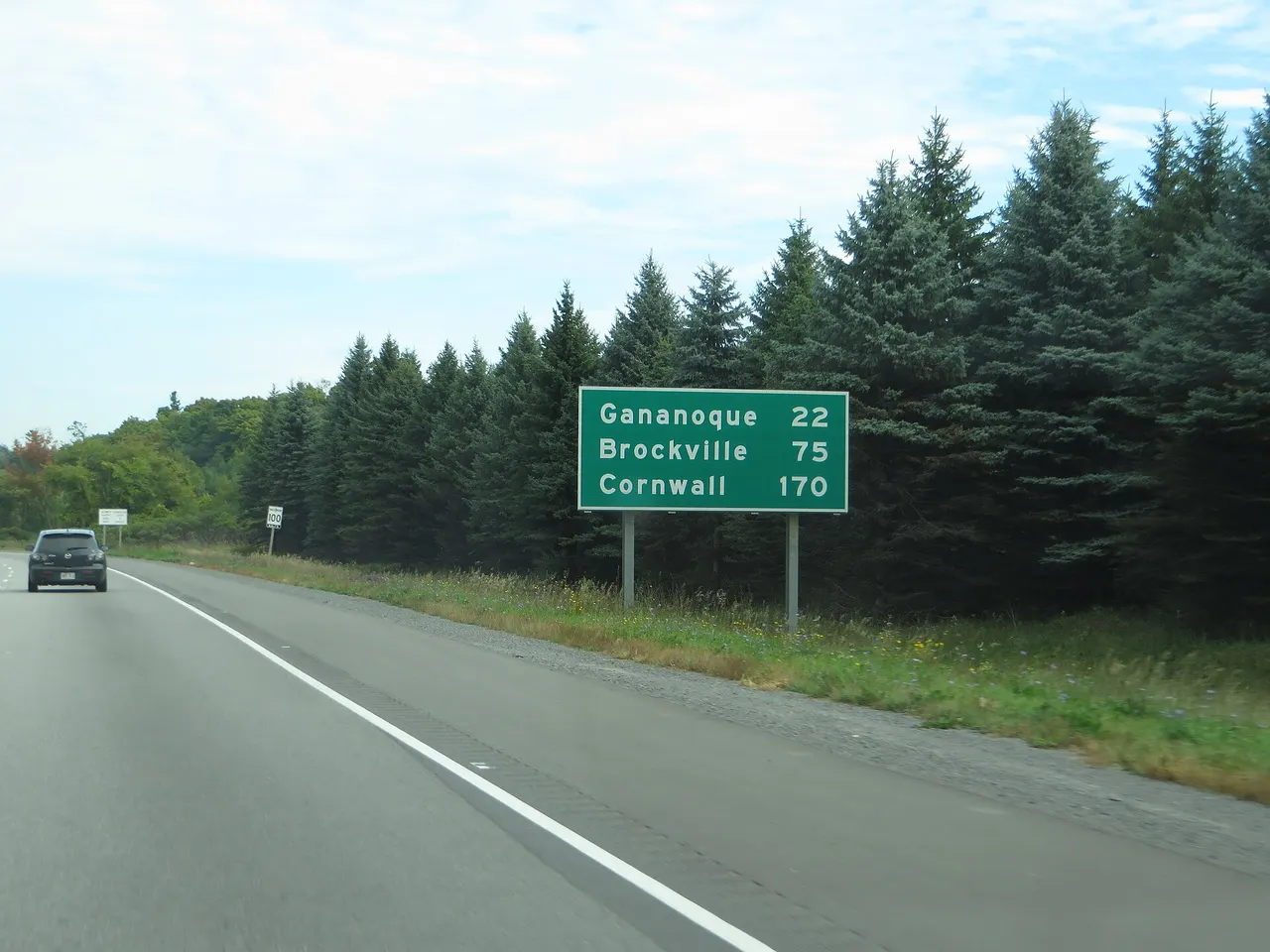 Multi-lane Highway 401 through Ontario countryside between Kingston and Brockville