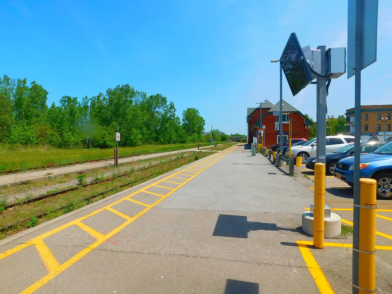 The historic stone railway station building at Niagara Falls, Ontario, seen from the road on a clear day