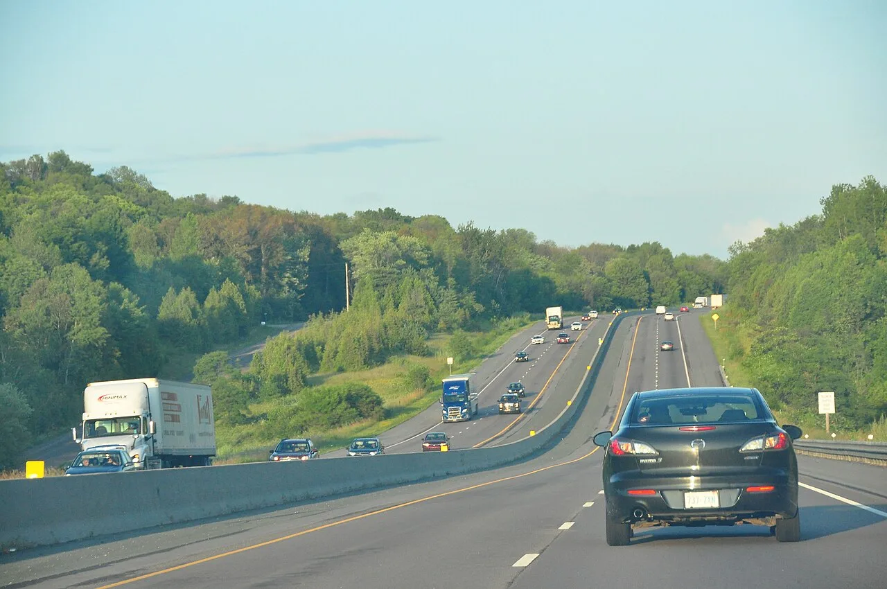 Multi-lane stretch of Highway 401 through Ontario countryside
