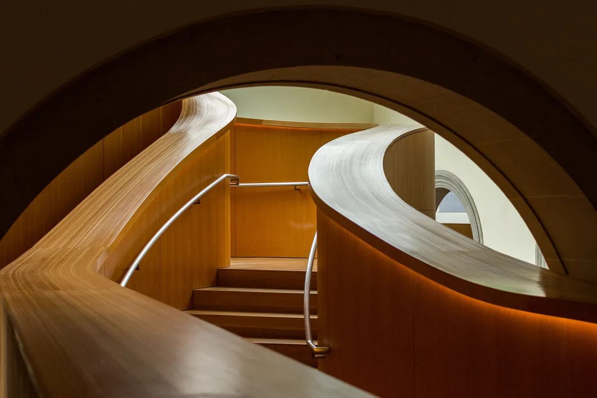 The curving wooden spiral staircase inside the Art Gallery of Ontario