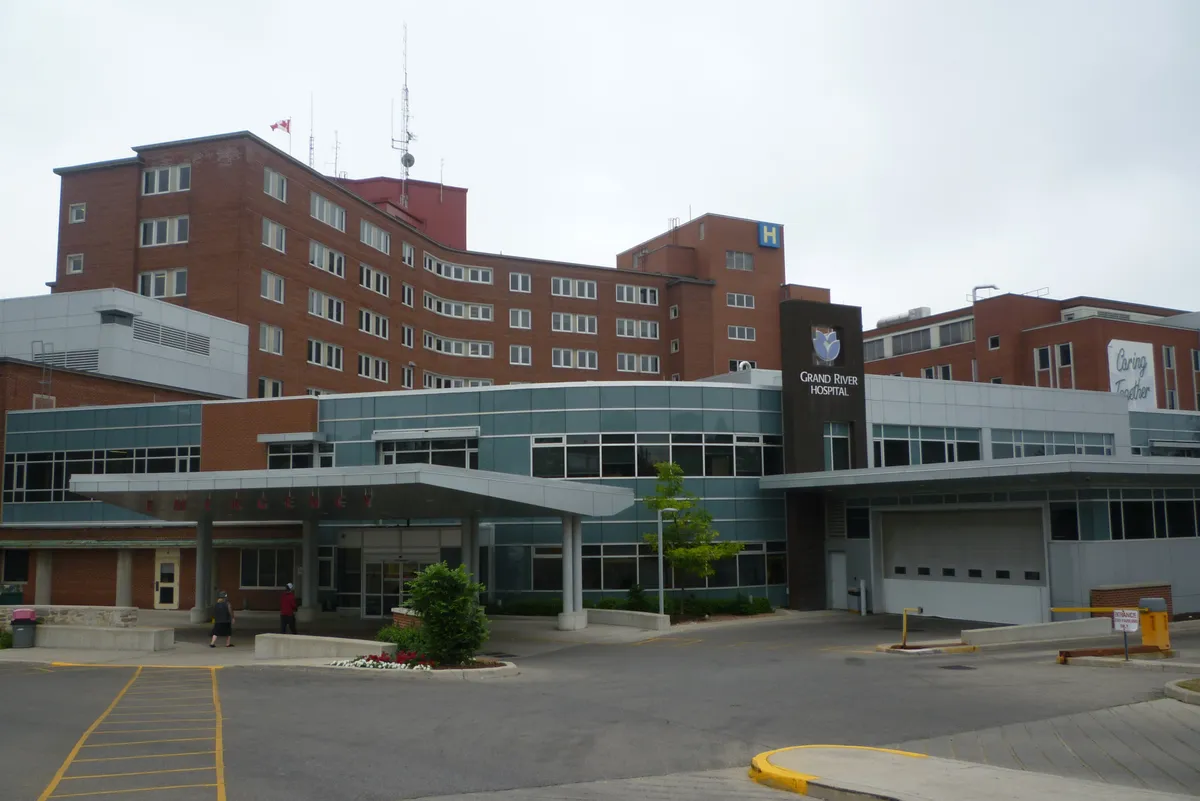 A large Canadian general hospital building seen from the street on an overcast day