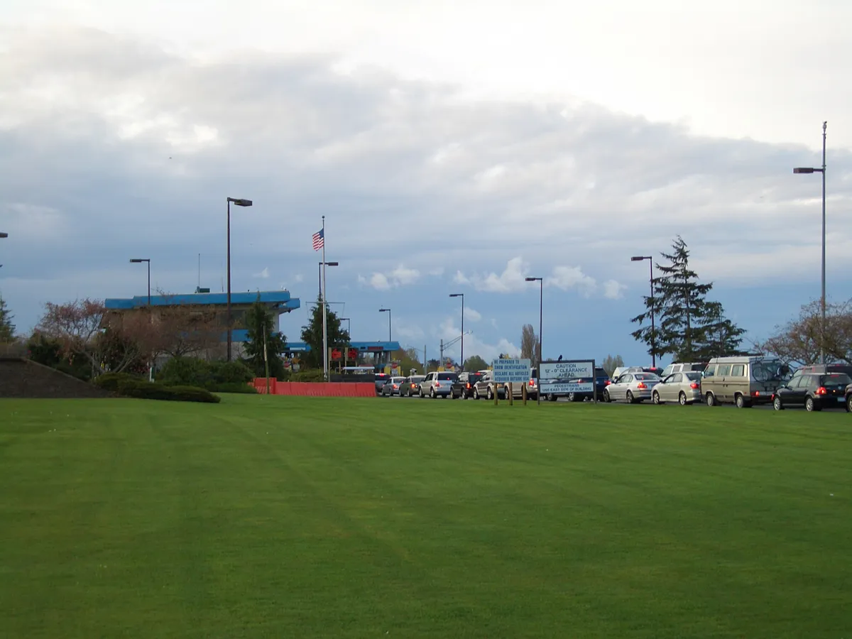 A long line of cars queued at the vehicle lanes approaching the US-Canada border at Peace Arch