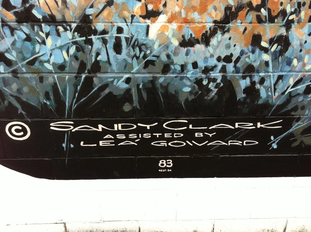 A large outdoor wall mural in the town of Chemainus on Vancouver Island