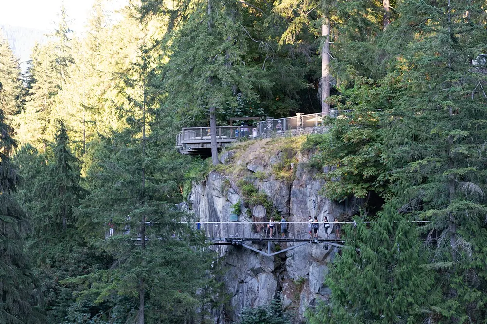 The cantilevered Cliffwalk walkway bolted to a granite cliff face at Capilano Suspension Bridge Park