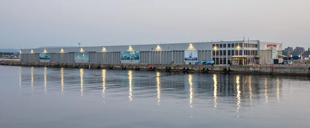 The long Ogden Point breakwater reaching into the sea at the mouth of Victoria's harbour