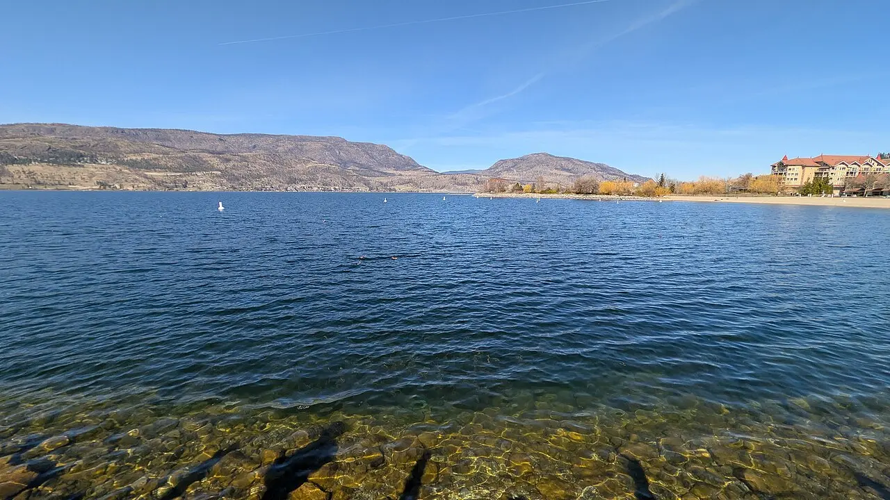 Wide view of Okanagan Lake and hills around Kelowna
