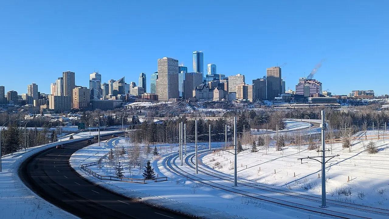 Downtown Edmonton towers in winter light with snow on the streets