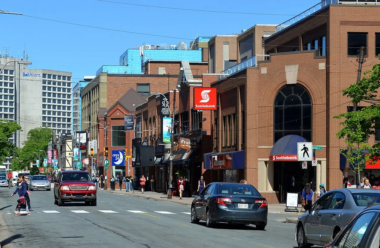 Shops, awnings and pedestrians along Spring Garden Road in Halifax on a sunny day
