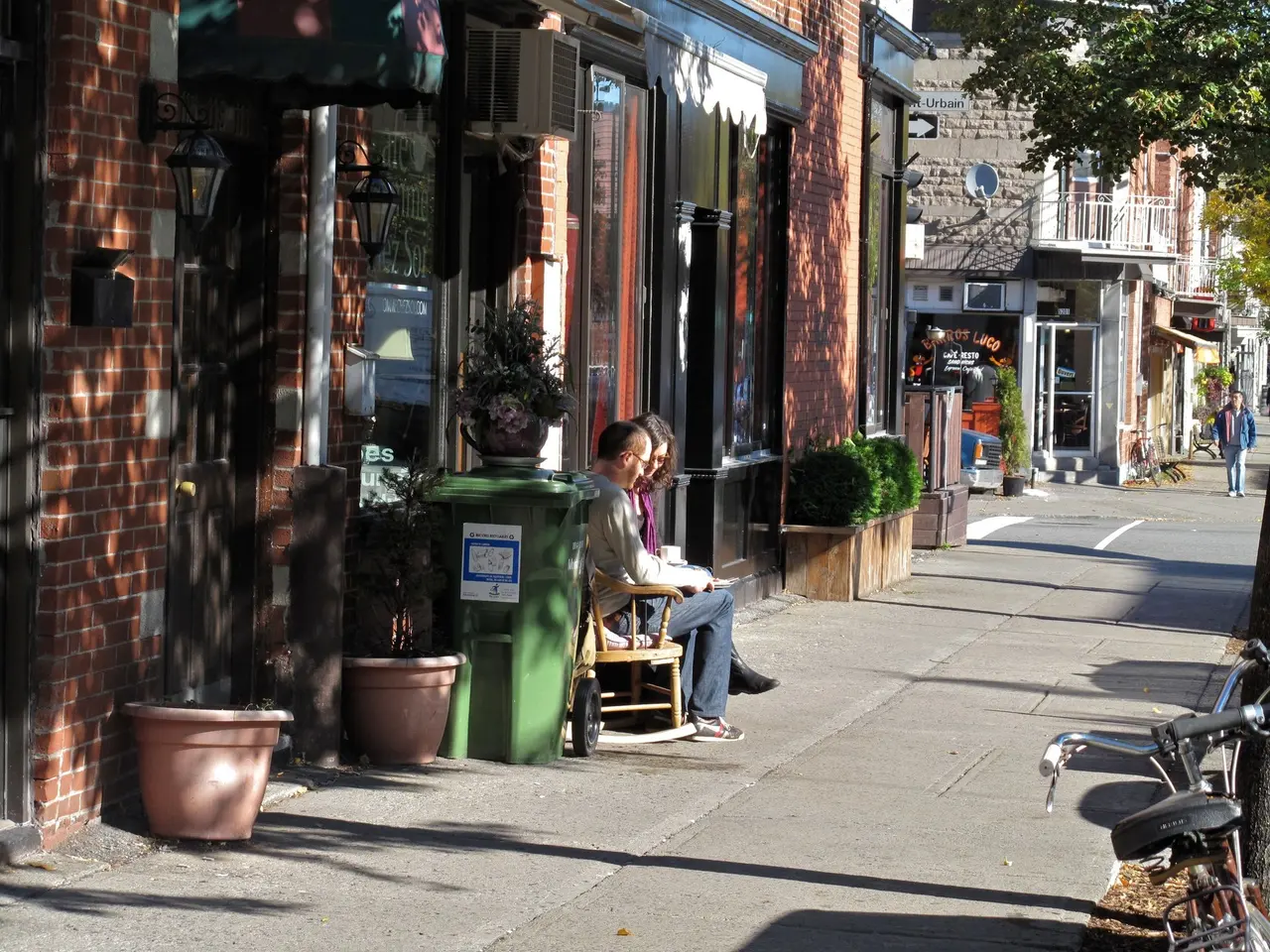 A residential cafe-lined street in the Mile End district of Montreal